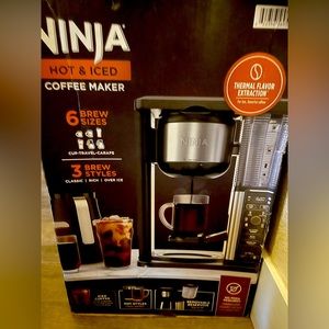 Brand new hot and cold coffee maker! Never been opened.